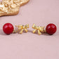 Елегантни обеци с червени имитации на перлиЕлегантни обеци с червени имитации на перли