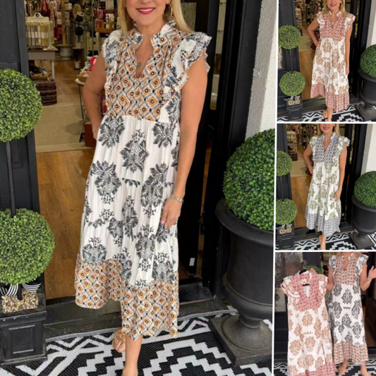 Елегантна печатана рокля с къдрици без ръкави