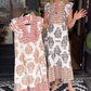 Елегантна печатана рокля с къдрици без ръкави